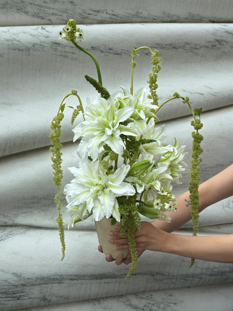 White and green floral arrangement at WDLT117